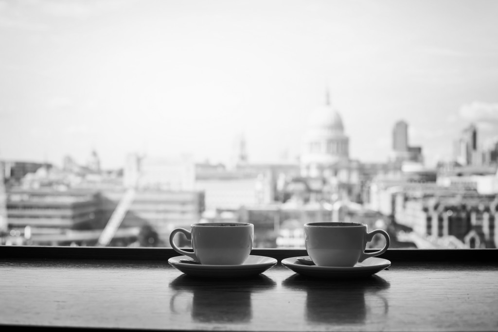 black and white view of London with two cups of coffee near St Paul cathedral